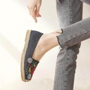 Women's casual shoes made of fabric adorned with elegant embroidery