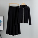 طقم نسائي أنيق مكون من قطعتين – كارديغان محبوك ضيق مع تنورة