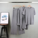 طقم أنيق من ثلاث قطع: بلوزة مع كارديغان محبوك متوسط الطول مع بنطال واسع الساق