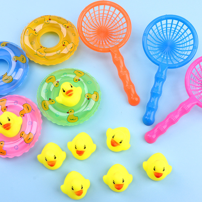 Children Playing With Water Toys Small Yellow Duck