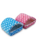 A warm and cozy house for small pets, elegantly designed and lined with soft fur to provide comfort and warmth 