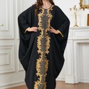 A modest abaya with charming traditional details, perfect for the modern Arabian woman