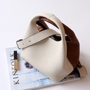 A women's bag with an elegant design and contrasting colors, adding a touch of distinction to your look