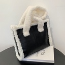 Elegant and cozy faux fur crossbody bag with a casual Western-inspired design