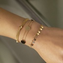 An elegant bracelet with a circular chain design, adorned with sparkling sequin details that add a touch of shine and sophistication to any look 