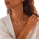 A trendy necklace featuring a flat snake chain design, adding a sleek and modern touch with a simple geometric style