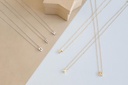 A complete set with an elegant, modern, and attractive design, including an alphabet letter necklace