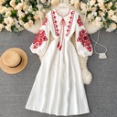 maxi dress with elegant floral embroidery, round neckline, lantern sleeves, and a loose, lightweight fit 
