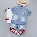 Two-piece denim outfit – short-sleeve shirt paired with shorts