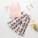 Summer girls' outfit consisting of a camisole-style blouse and elegant trousers