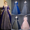 Luxurious evening gown for hijabi women with puffy long sleeves and exquisite golden embroidery – an elegant handmade design that adds a regal touch