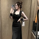 Elegant French dress with a square neckline, puffed tulle sleeves, and a fishtail hem in a classic style