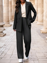 Elegant women's set featuring a notched collar blazer with double buttons and matching pants