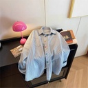 Women's long-sleeved shirt with an elegant design suitable for various occasions