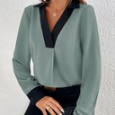 Women's casual blouse/shirt with an elegant design, featuring a V-neckline and contrast color details that add a modern and eye-catching touch