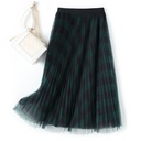 Mesh skirt with pleated folds, high waist, and mid-length — perfect for elegant and breezy spring outfits