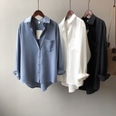 Elegant women's shirt with long sleeves and a classic lapel collar design