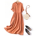 Elegant women's dress featuring a shirt collar and short sleeves