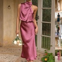 Elegant sleeveless women's dress with a halter neckline, perfect for evenings and special occasions