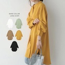 Women's long-sleeved shirt with a loose fit and a stylish, comfortable mid-length design
