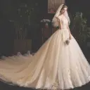 An elegant wedding dress meticulously designed to give you a captivating look that radiates femininity and highlights your beauty in every detail