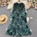 Women's long floral dress with a waist-defining design and long sleeves for an elegant feminine look
