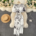 A lightweight dress with elegant prints and delicate lace embroidery