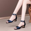 Medium-heel open-toe shoes adorned with rhinestones