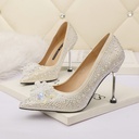 High-heeled pointed shoes with rhinestone accents and a shallow-cut design that highlights elegance