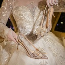 Women's pointed stiletto heels adorned with a bow and rhinestones in an elegant French design