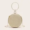Diamond-encrusted round evening bag with an elegant chain