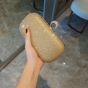 Diamond-studded evening clutch bag with an elegant shoulder chain