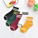 Cute striped tube socks for children with a baby bear design