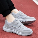 Women's comfortable walking shoes with a soft, widened sole and Velcro closure