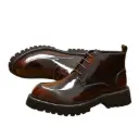 Men’s short-ankle boots with a side zipper, made of glossy genuine leather in a British-style design