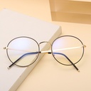 Modern round metal glasses with blue light protection