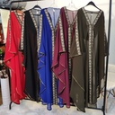 An abaya with a modern and attractive design, inspired by Islamic and Eastern heritage