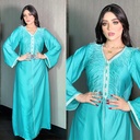 A kaftan dress with a unique and elegant design  